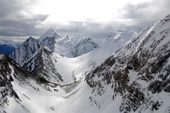 18 Cone Mountain Summits Close Up From Helicopter Between Canmore And Mount Assiniboine In Winter.jpg